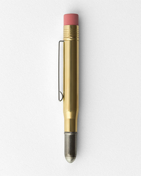 A novelty eraser pen with a gold-colored metallic body, a pink eraser tip, and a silver metal tip, shown on a light gray background.